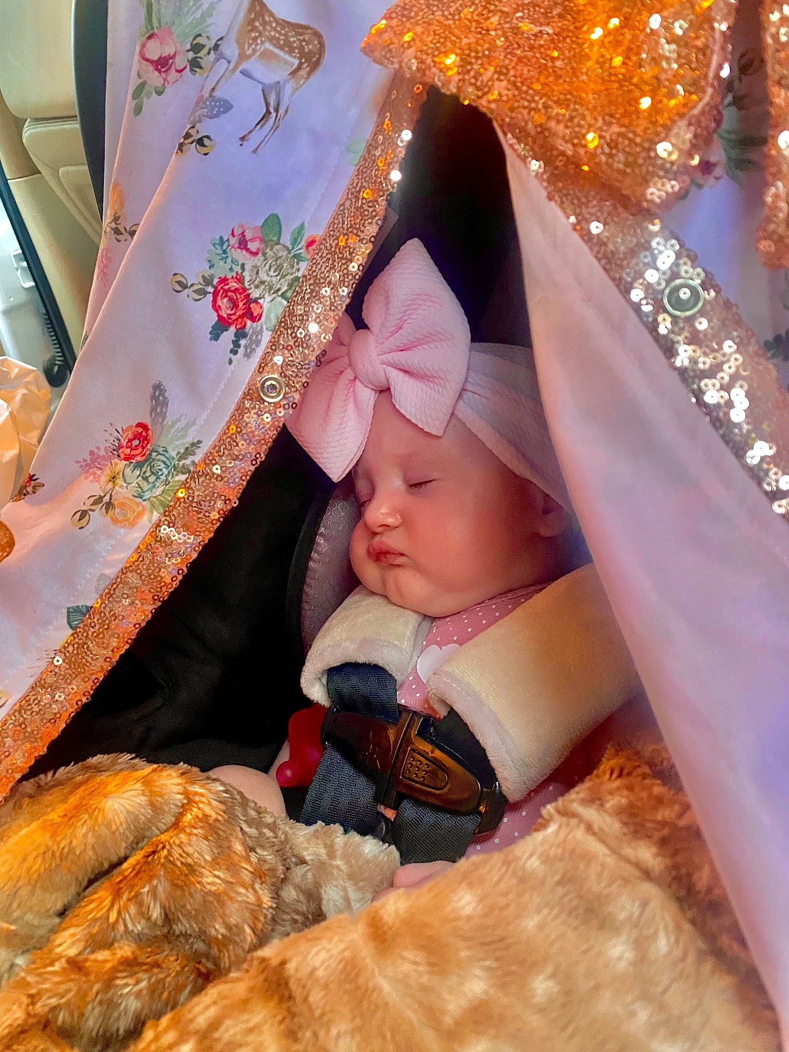 Ellamae is registered to the contest to win money with this photo: bridal_accessory, child, comfort, crown, doll, dress, event, fashion_accessory, fur, head, headpiece, headwear, jewellery, linens, pattern, peach, person, room, sitting, textile