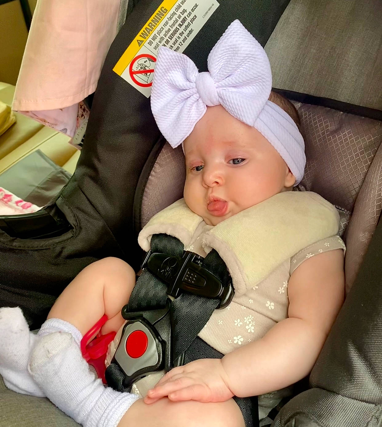 Ellamae is registered to the contest to win money with this photo: arm, baby, baby_carriage, baby_products, baby_safety, baby_sleeping, baby_toddler_clothing, cap, cheek, child, comfort, finger, hand, headwear, lap, nail, person, product, skin, thigh