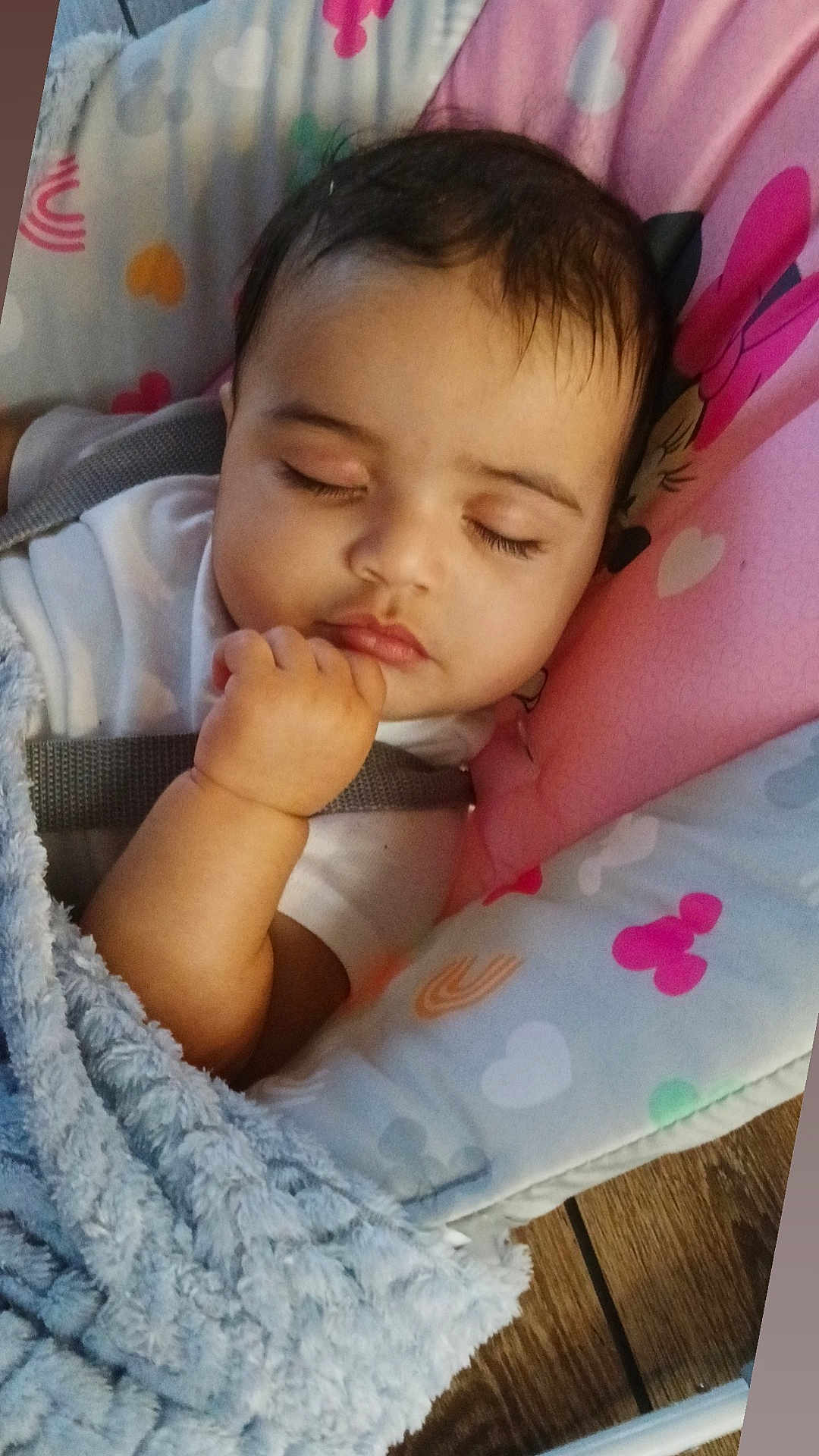 Krisus joined the competition — help win amazing prizes! baby, blanket, child, clothing, colorful, cushion, cute, face, hand, heart_pattern, indoor, infant, peaceful, pillow, rainbow_pattern, resting, seat, sleeping, soft_texture, wooden_floor