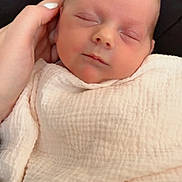 Katharina is registered to the contest to win money with this photo: baby, newborn, sleeping, blanket, hand, soft, cradle, peaceful, infant, face, skin, nails, toddler, portrait, closeup, resting, cute, child, wrapped, comfort