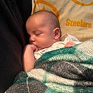 Colson joined the competition — help win amazing prizes! baby, blanket, child, closeup, comfort, cozy, cushion, cute, face, hand, indoors, infant, peaceful, person, pillow, plaid, resting, sleeping, soft, toddler