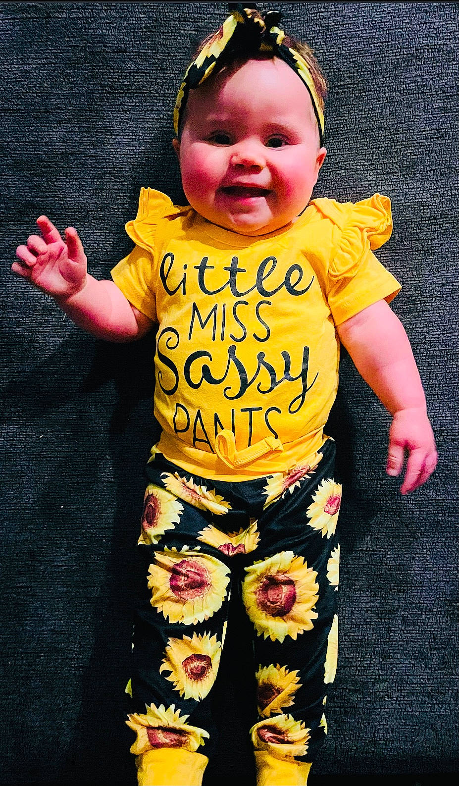 Lauryn joined the competition — help win amazing prizes! arm, baby, baby_toddler_clothing, cap, child, eye, face, finger, font, gesture, hand, happy, head, human_body, person, pink, sleeve, smile, t_shirt, toddler