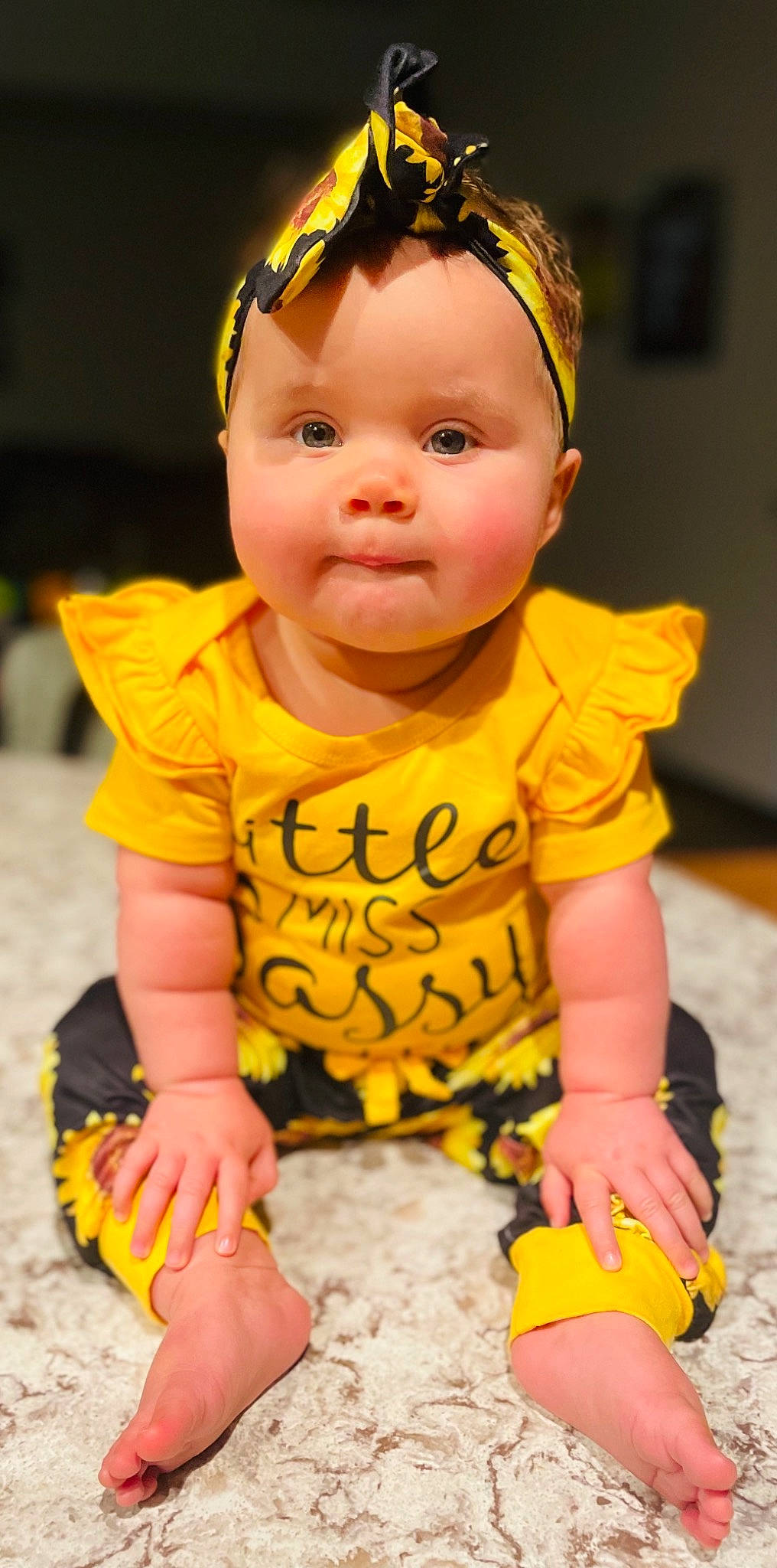 Lauryn joined the competition — help win amazing prizes! baby, baby_toddler_clothing, black, cheek, chin, face, facial_expression, finger, fun, hand, happy, head, nose, orange, person, photograph, skin, sleeve, smile, white