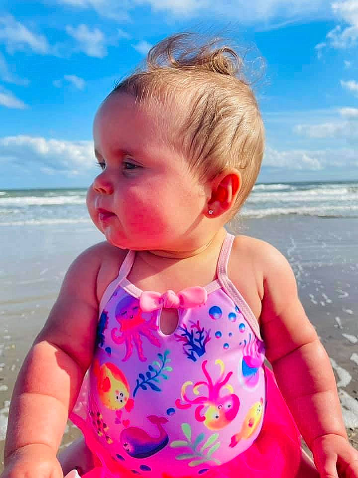 Lauryn joined the competition — help win amazing prizes! baby, baby_toddler_clothing, beach, beauty, blond, blue, child, clothing, cloud, cool, fun, happy, light, person, pink, skin, sky, sleeve, sunlight, toddler