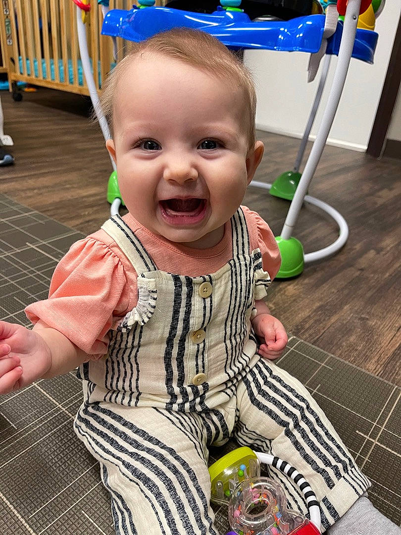 Annaleigh joined the competition — help win amazing prizes! arm, baby_toddler_clothing, cheek, dress, eye, face, green, hand, happy, head, leg, nose, person, product, skin, sleeve, smile, standing, toddler, wood