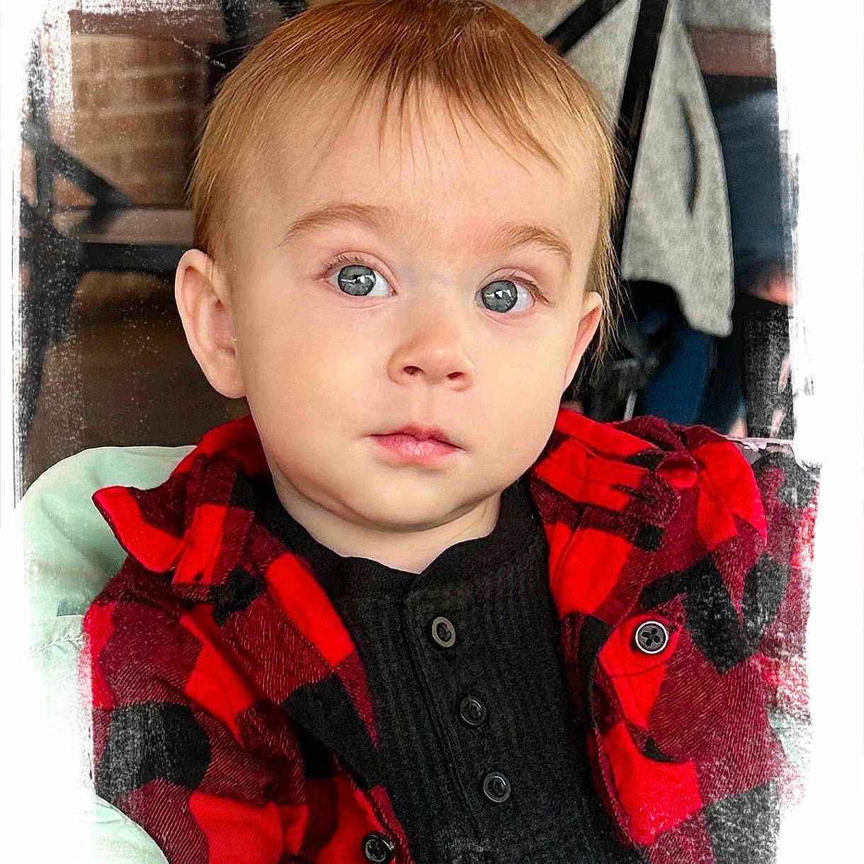 Bentley is registered to the contest to win money with this photo: baby, blonde, clothing, coat, face, frown, hair, head, hood, jacket, knitwear, pants, person, photography, portrait, sad, selfie, shirt, sitting, sweater