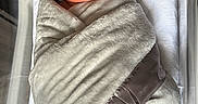 June joined the competition — help win amazing prizes! newborn, baby, blanket, swaddled, sleeping, infant, bassinet, hospital, soft, plush, towel, wrapped, child, face, peaceful, cute, resting, indoors, person, newborn_baby