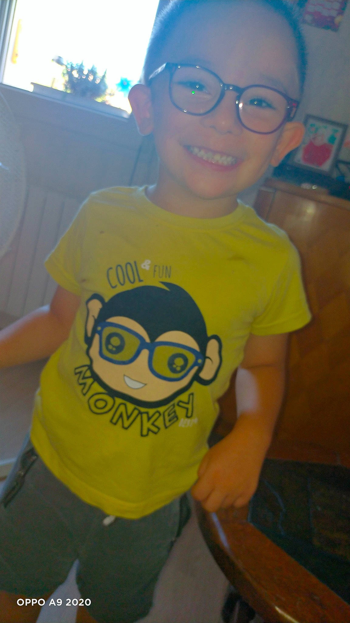 Ethan participe au concours pour gagner de l'argent avec cette photo : active_shirt, baby_toddler_clothing, cool, eyewear, facial_expression, font, fun, goggles, happy, joy, mouth, organ, people, person, personal_protective_equipment, sleeve, smile, t_shirt, toddler, top