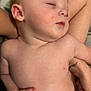 Greyson is registered to the contest to win money with this photo: baby, sleeping, diaper, skin, hand, tattoo, arm, person, infant, peaceful, closeup, indoors, resting, child, cute, soft, nap, comfort, blanket, holding