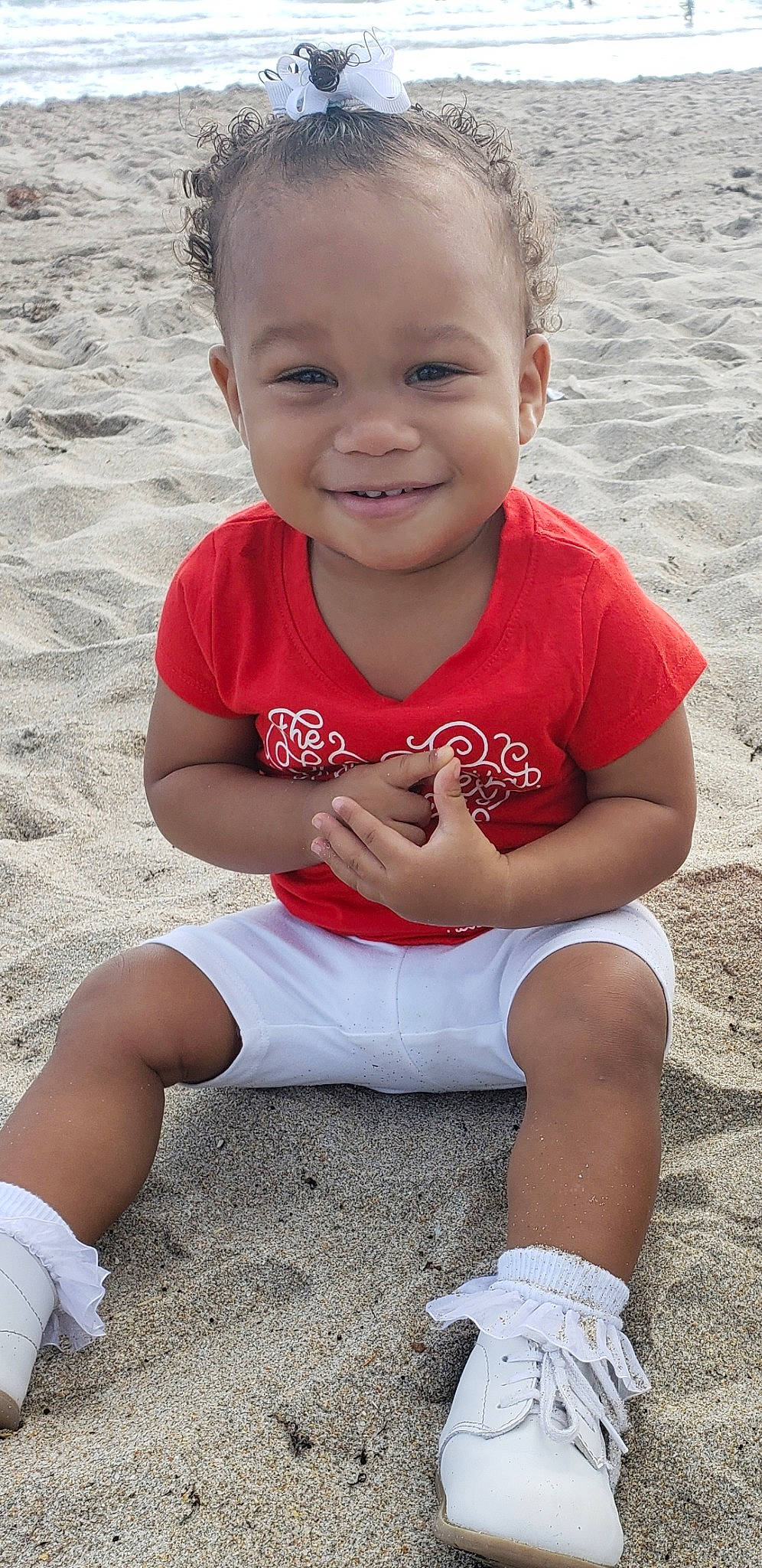 Leyla joined the competition — help win amazing prizes! abdomen, child, day, fun, girl, happiness, infant, joy, leg, person, play, product, red, sand, sitting, skin, smile, summer, toddler, vacation