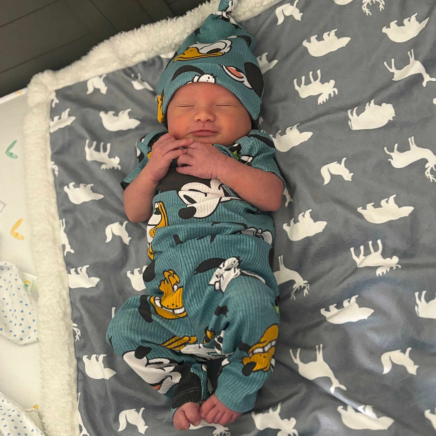 Hudson is registered to the contest to win money with this photo: baby, bed, blanket, bonnet, clothing, couch, cradle, crib, face, furniture, hat, head, homedecor, infantbed, newborn, person, photography, portrait, quilt, sleeping