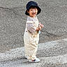 Nathan joined the competition — help win amazing prizes! child, toddler, smiling, outdoor, pavement, sidewalk, hat, sun_hat, overalls, striped_shirt, sneakers, toy, pink_toy, standing, portrait, full_body, fashion, street, daylight, happy