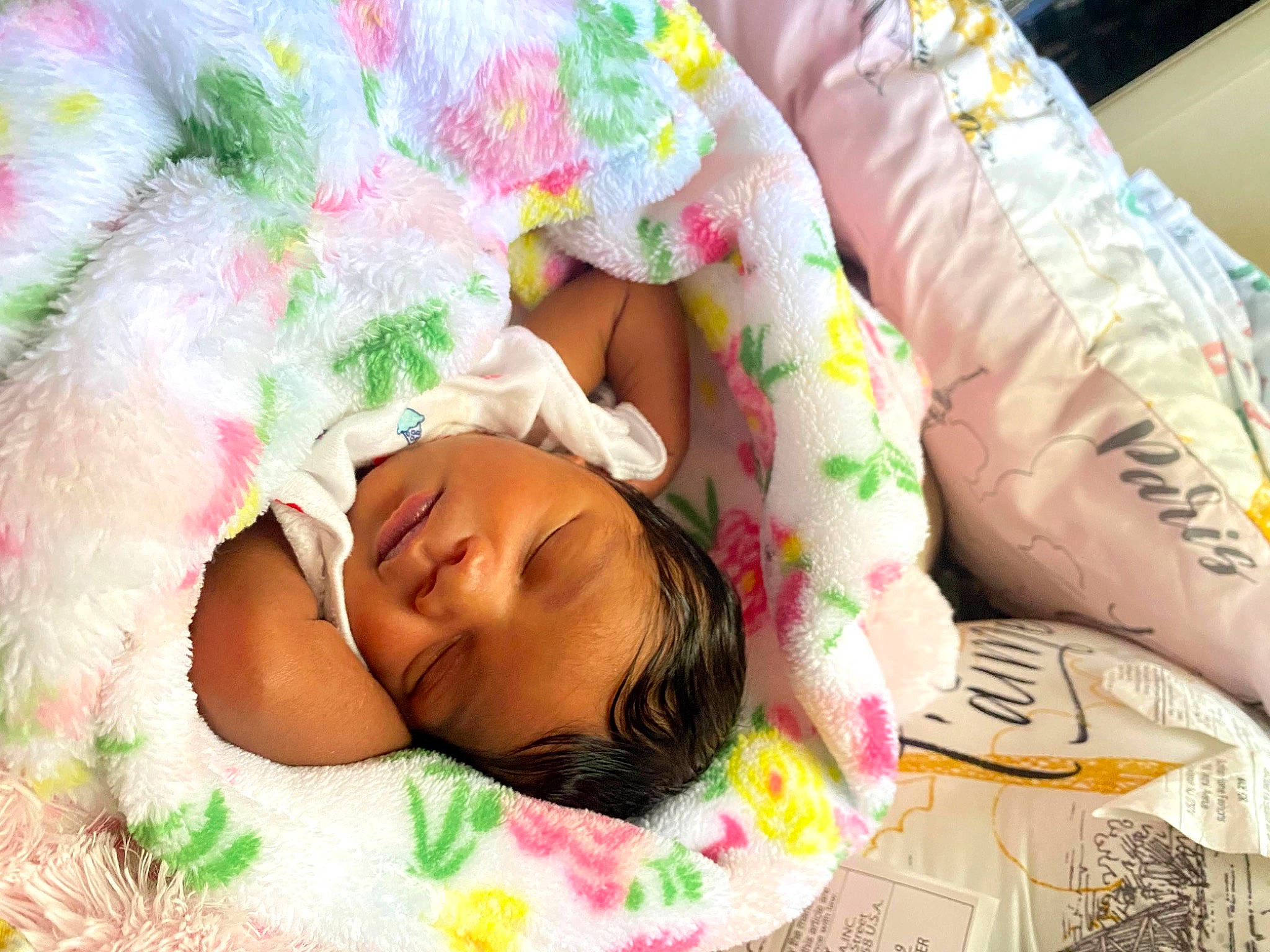 Londynn is registered to the contest to win money with this photo: arm, baby, baby_products, baby_sleeping, baby_toddler_clothing, bed, bedding, bedtime, child, comfort, couch, facial_expression, grass, happy, headgear, linens, person, pink, skin, textile