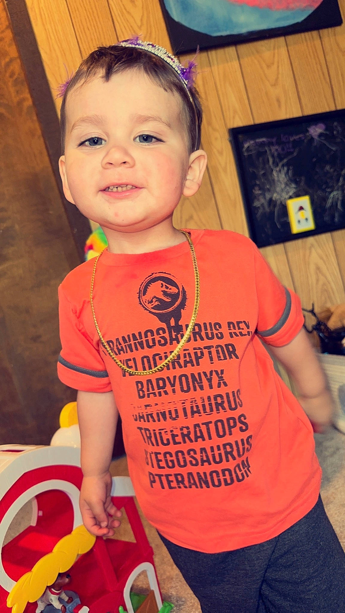 Emmet joined the competition — help win amazing prizes! baby, baby_toddler_clothing, child, clothing, cool, flooring, fun, hairstyle, happy, logo, neck, orange, organ, person, product, red, sleeve, smile, standing, t_shirt