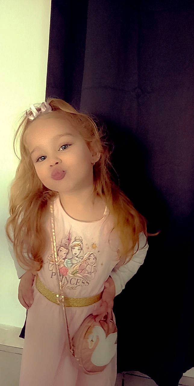 Lyana participe au concours pour gagner de l'argent avec cette photo : baby_toddler_clothing, cheek, chin, dress, eye, eyebrow, eyelash, face, facial_expression, flash_photography, hair, happy, head, iris, lip, neck, person, pink, shoulder, skin