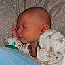 Winston joined the competition — help win amazing prizes! baby, sleeping, onesie, teddy_bear, blanket, bottle, pillow, bed, infant, peaceful, child, resting, cute, cozy, patterned, soft, indoors, head, face, hand