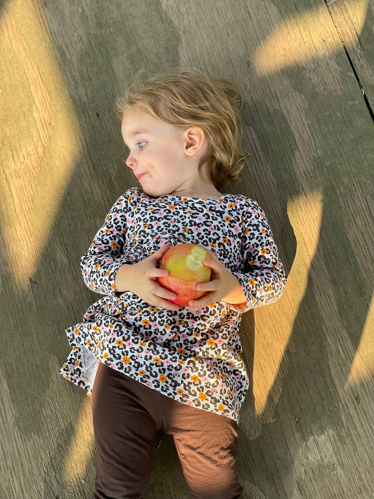 Emery is registered to the contest to win money with this photo: arm, baby_toddler_clothing, face, flooring, fun, happy, human_body, iris, joint, knee, people_in_nature, person, skin, sleeve, standing, textile, thigh, toddler, trunk, waist