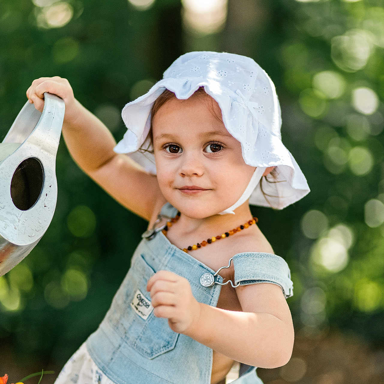 Everly is registered to the contest to win money with this photo: accessories, baby, bodypart, bonnet, cap, clothing, dress, face, finger, hand, hat, head, jewelry, necklace, paper, person, photography, portrait, sunhat, towel