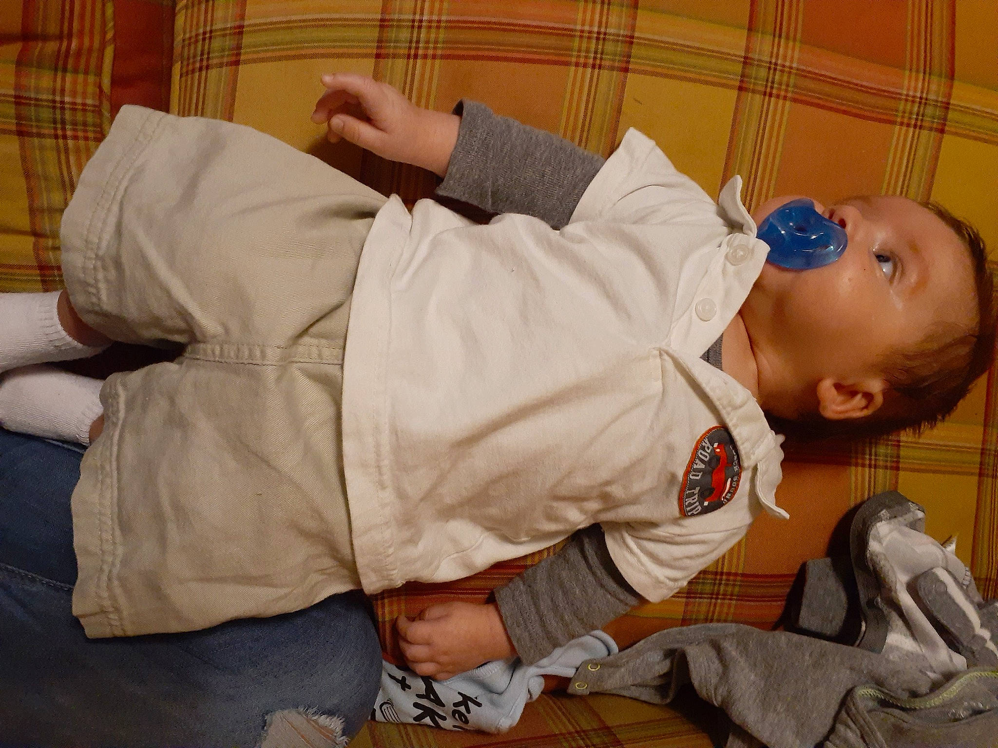 Patrick is registered to the contest to win money with this photo: baby, baby_products, baby_toddler_clothing, child, comfort, elbow, fun, gesture, head, joint, knee, mouth, person, room, sitting, sleep, thumb, toddler