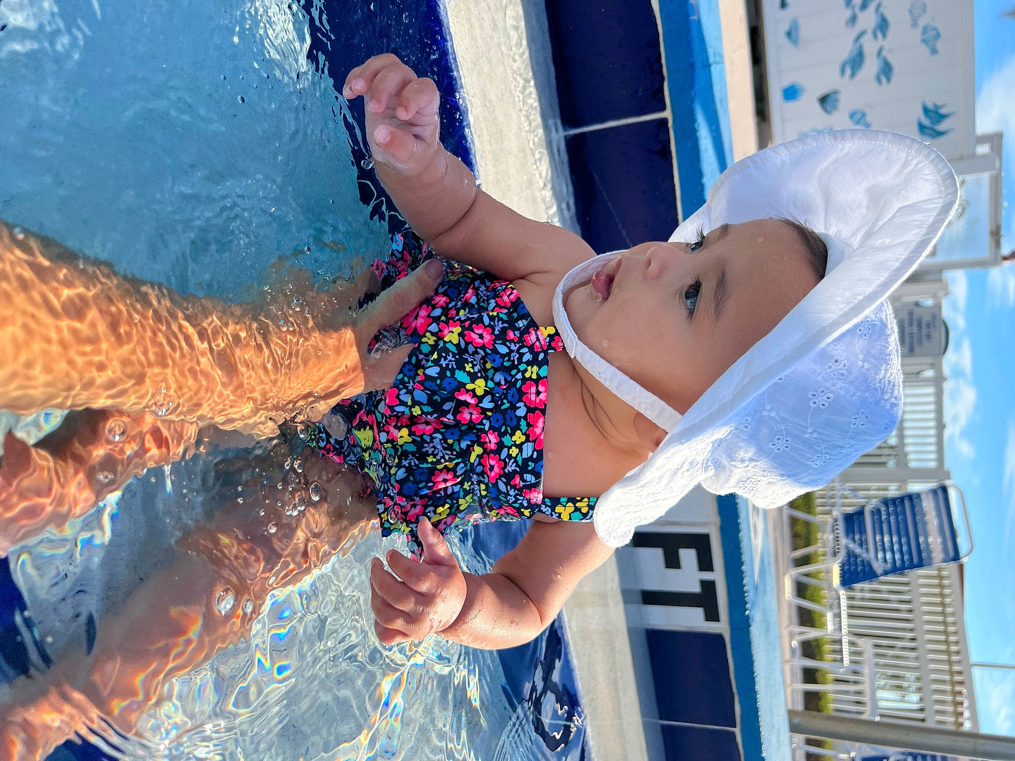 Angelica is registered to the contest to win money with this photo: azure, beauty, blue, child, dress, elbow, electric_blue, finger, fluid, fun, gesture, hand, happy, headwear, leisure, liquid, person, recreation, summer, swimming_pool