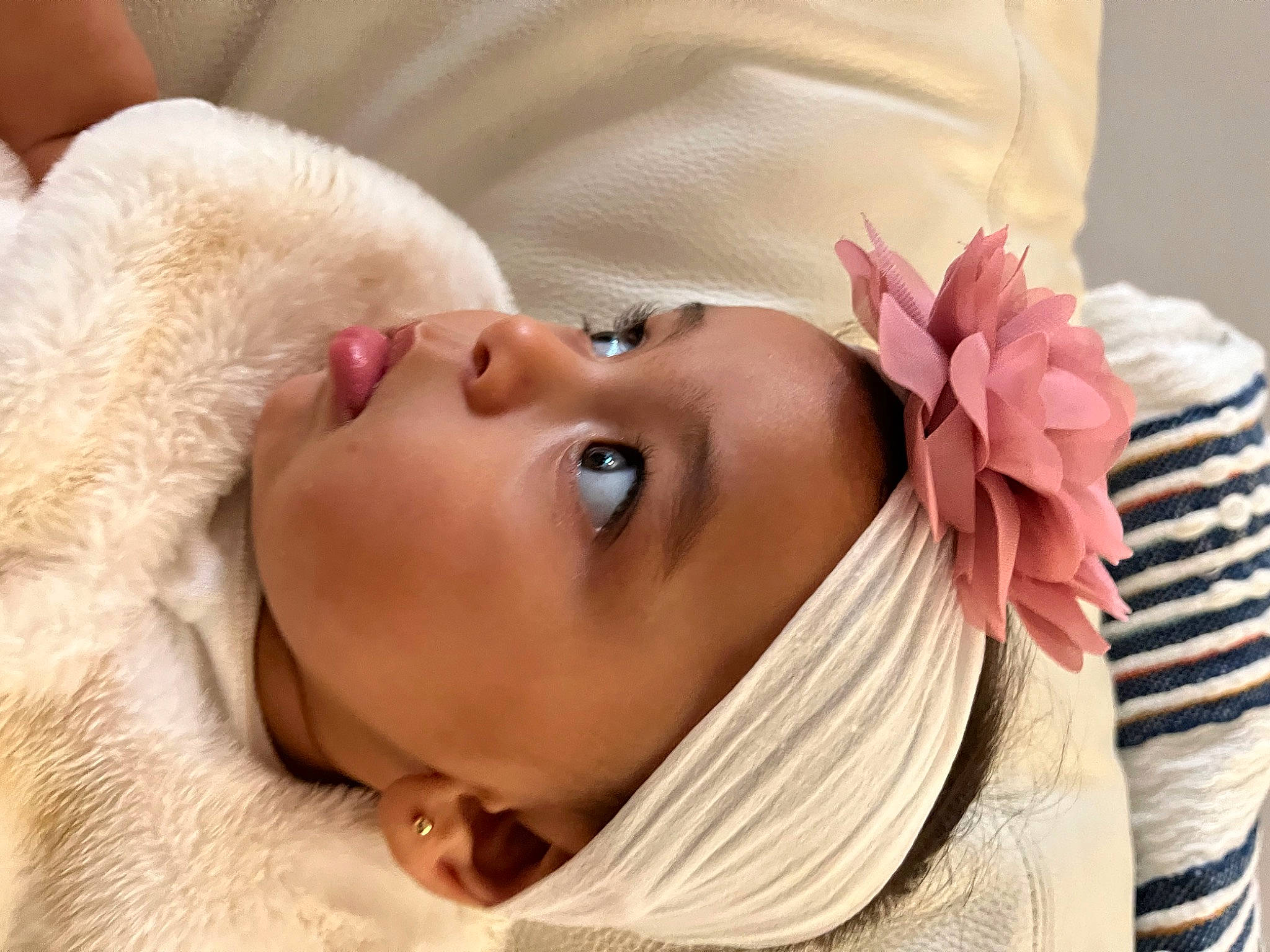 Angelica is registered to the contest to win money with this photo: arm, baby, beauty, chin, comfort, ear, eye, eyebrow, eyelash, hair, happy, headband, headgear, headwear, lip, neck, person, pink, shoulder, skin