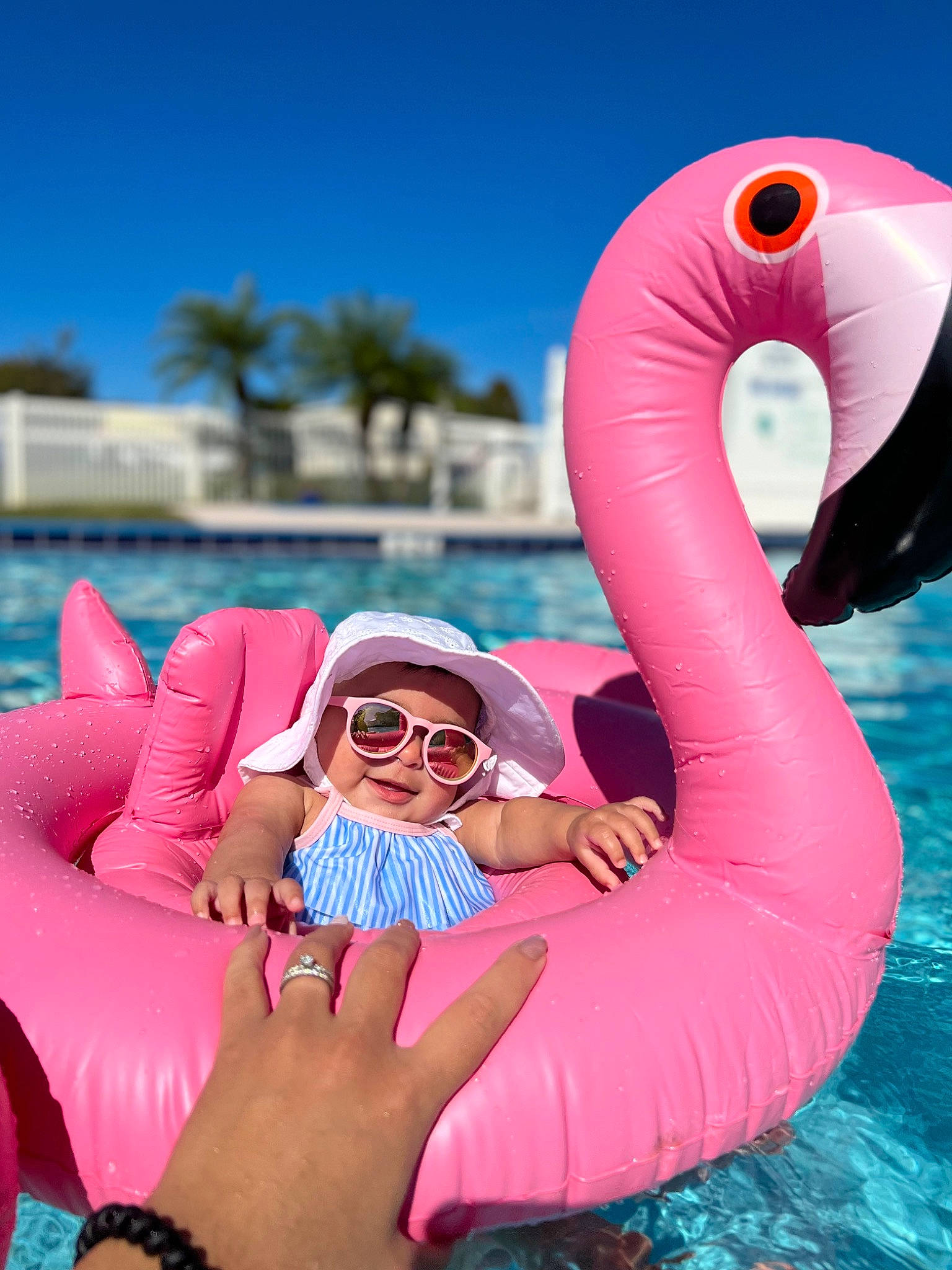 Angelica joined the competition — help win amazing prizes! aqua, azure, blue, eyewear, finger, flamingo, fun, goggles, hand, happy, leisure, muscle, person, pink, recreation, sky, smile, summer, sunglasses, vision_care