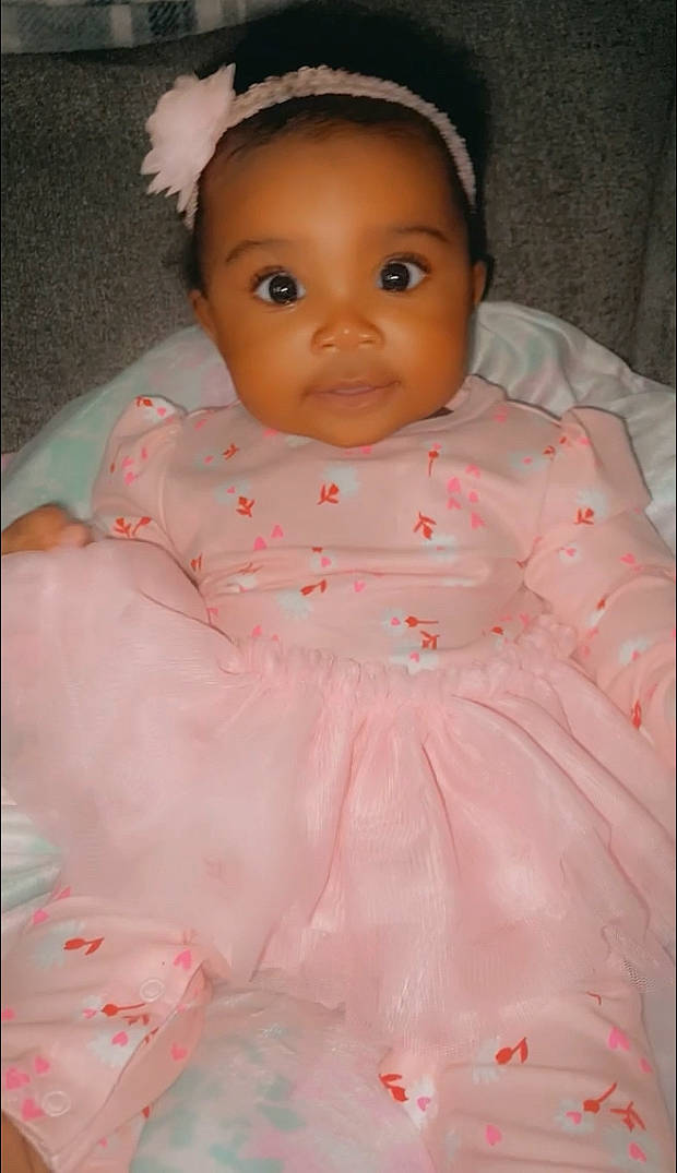 Destiny joined the competition — help win amazing prizes! baby, baby_products, baby_toddler_clothing, cheek, dress, eye, eyelash, hair, happy, head, iris, linens, lip, nose, pattern, peach, person, pink, skin, sleeve