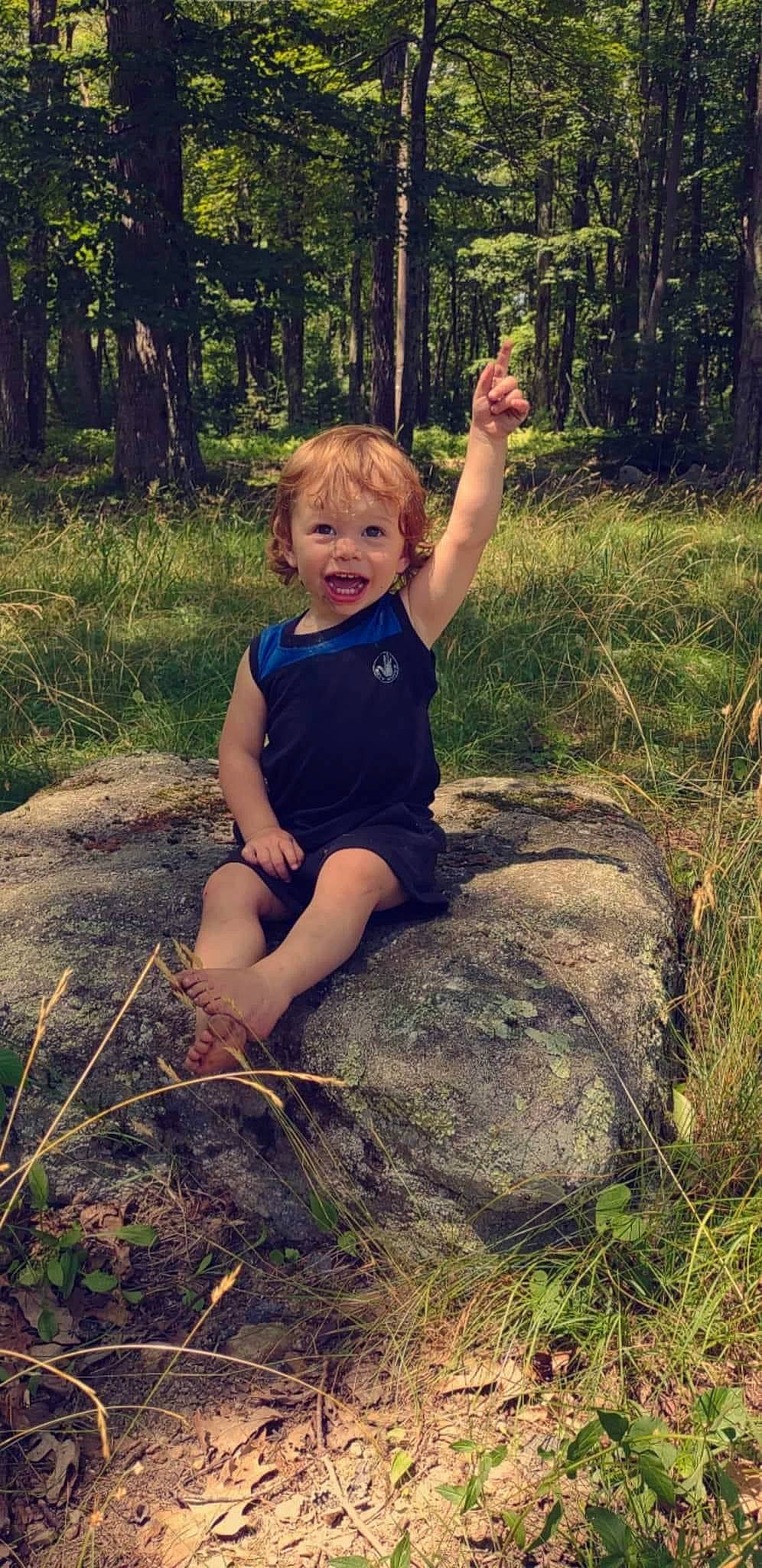 Leviathan joined the competition — help win amazing prizes! branch, child, ecoregion, forest, fun, grass, grass_family, happy, human_leg, natural_environment, people_in_nature, person, plant, smile, terrestrial_plant, thigh, toddler, tree, trunk, wood