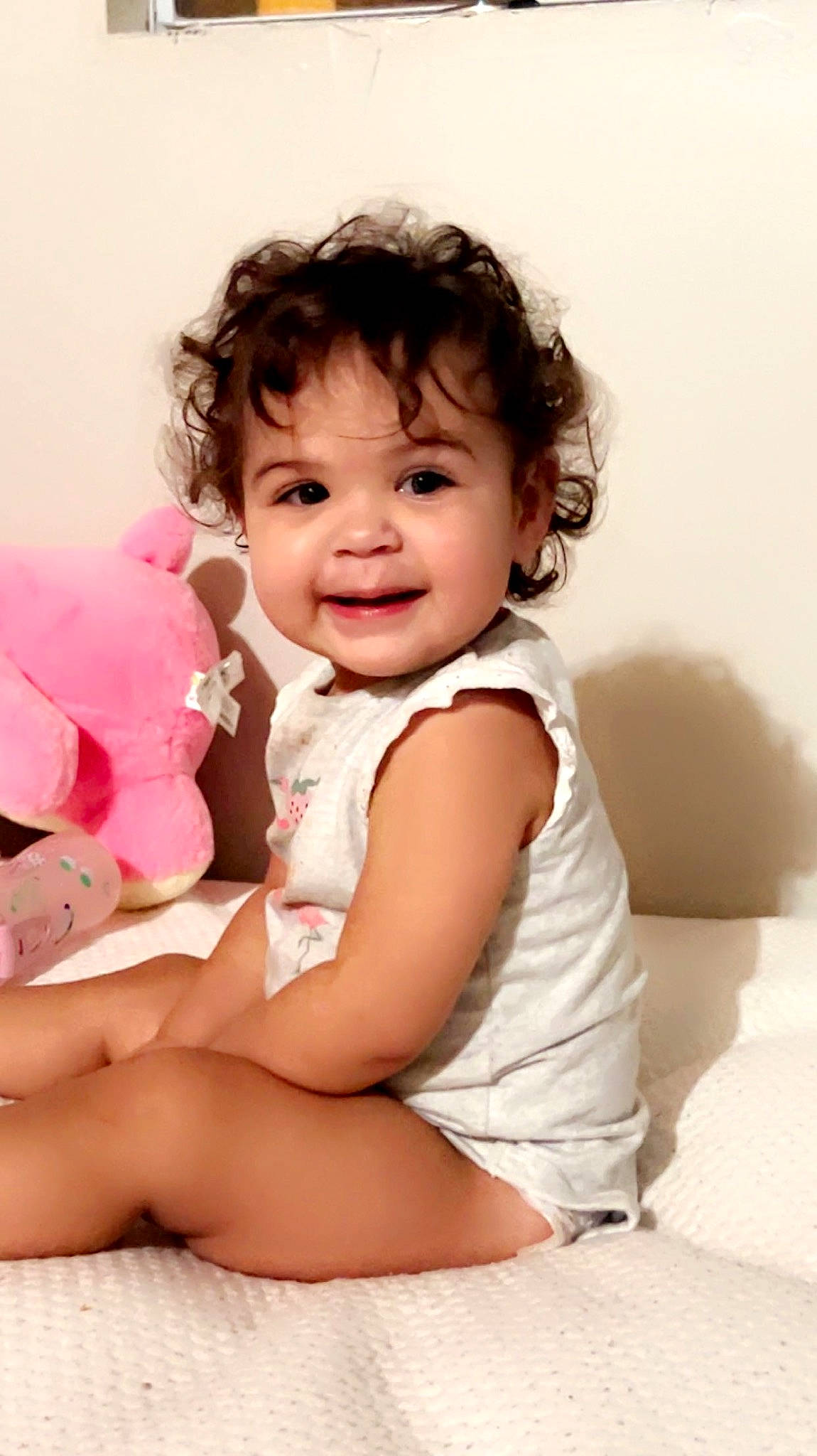 Layan is registered to the contest to win money with this photo: baby, baby_toddler_clothing, cheek, chin, comfort, eye, face, flash_photography, gesture, happy, head, joy, leg, lip, person, skin, sleeve, smile, standing, stomach