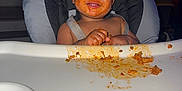 Julien joined the competition — help win amazing prizes! baby, child, clothing, cute, dining, face, feeding, food, hands, happy, high_chair, indoor, kitchen, meal, messy, person, seat, smiling, spaghetti_sauce, tongue_out