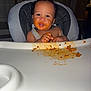 Julien joined the competition — help win amazing prizes! baby, high_chair, messy, food, face, hands, indoor, child, smile, plate, tray, cooking, meal, cute, fun, infant, feeding, happy, expression, person