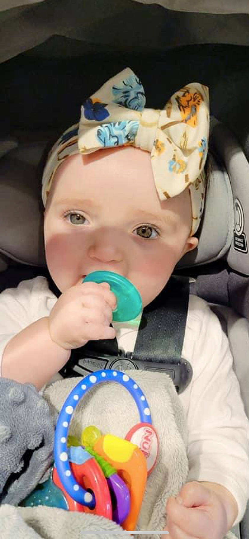 Leilanni joined the competition — help win amazing prizes! baby, baby_playing_with_toys, baby_products, baby_toddler_clothing, child, drinkware, event, finger, fun, happy, helmet, iris, jewellery, nose, party, party_supply, person, plastic_bottle, product, toddler