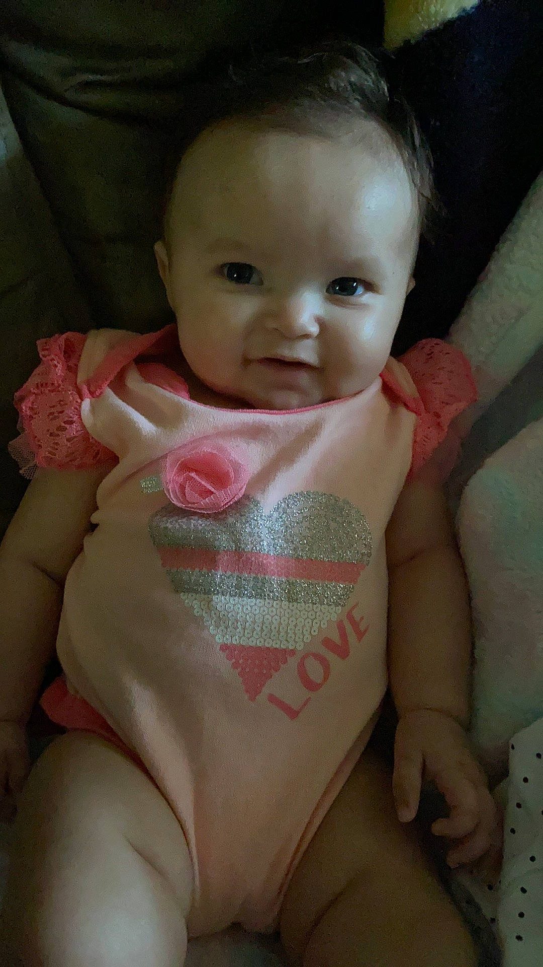 Ivelisse is registered to the contest to win money with this photo: arm, baby_toddler_clothing, cheek, chin, eye, eyebrow, face, facial_expression, finger, hand, head, human_body, iris, lip, mouth, neck, nose, person, skin, sleeve