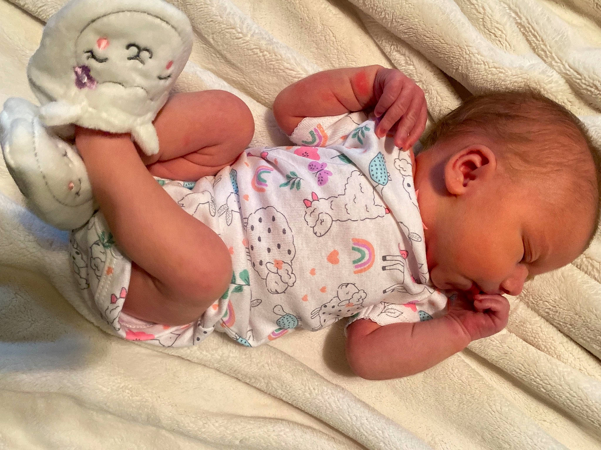 Arrow is registered to the contest to win money with this photo: baby, baby_products, baby_sleeping, baby_toddler_clothing, bedtime, cheek, child, comfort, eye, finger, hat, headgear, human_body, leg, linens, mouth, nose, person, skin, textile