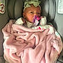 baby, infant, car_seat, blanket, pink, pacifier, headband, bow, wrapped, cute, child, newborn, sleepwear, cozy, indoor, portrait, soft, clothing, resting, infant_care