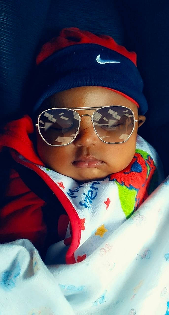 Jonah is registered to the contest to win money with this photo: baseball_cap, cap, cheek, chin, cool, eye, eyebrow, eyewear, flash_photography, goggles, happy, head, headwear, lip, mouth, nose, outerwear, person, sleeve, sunglasses