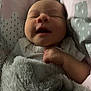 Ivy is registered to the contest to win money with this photo: baby, sleeping, blanket, cozy, infant, face, hand, soft, comfort, cute, bed, pillow, child, rest, peaceful, portrait, indoors, clothing, newborn, snug