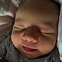 Ivy joined the competition — help win amazing prizes! baby, sleeping, closeup, face, smile, blanket, polka_dot, infant, cozy, peaceful, child, cute, soft, newborn, apparel, head, portrait, resting, indoors, warm