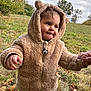 baby, bear_ears, child, clothing, cute, expression, face, fall, grass, hand_holding, hoodie, leaves, nature, outdoor, person, portrait, sky, toddler, trees, walking