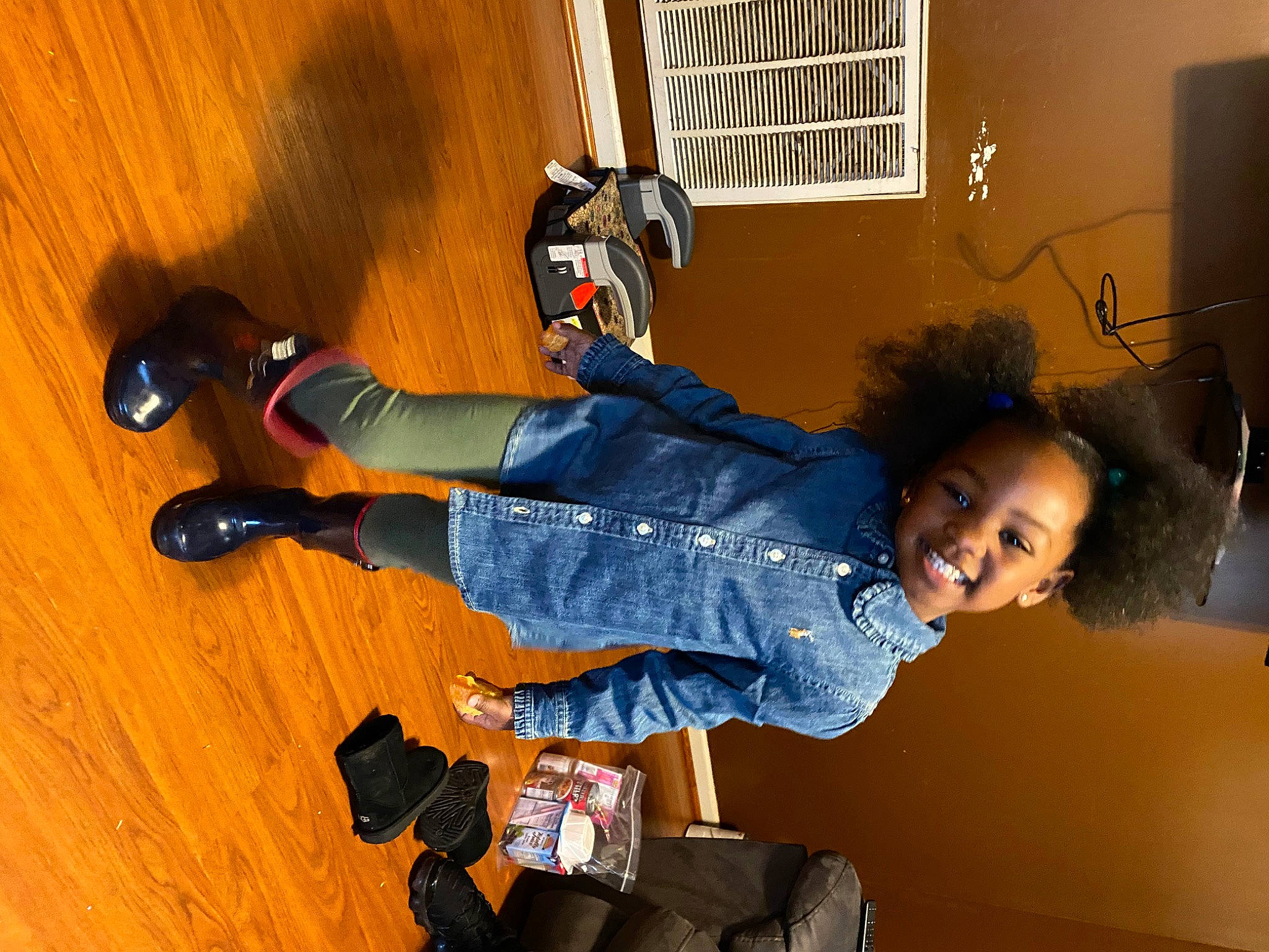 Khalaya is registered to the contest to win money with this photo: boot, child, electric_blue, flash_photography, flooring, fun, hardwood, jeans, joy, knee, leg, outdoor_shoe, person, sitting, smile, sneakers, sock, sports_gear, thigh, toddler