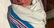 Ryker joined the competition — help win amazing prizes! newborn, baby, infant, sleeping, swaddled, blanket, hat, striped_blanket, portrait, face, closed_eyes, peaceful, hospital_bassinet, white_clothing, blue, pink, bed, indoor, cozy, photography