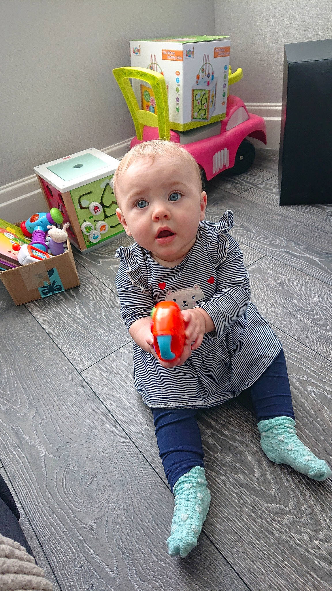 Maisie joined the competition — help win amazing prizes! baby, baby_toys, child, fun, leg, person, play, room, sitting, smile, surprise, toddler, toy