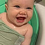 baby, child, bath, water, smiling, happy, towel, skin, wet, cute, infant, splash, closeup, face, arm, indoors, blue_eyes, chubby, joy, playful