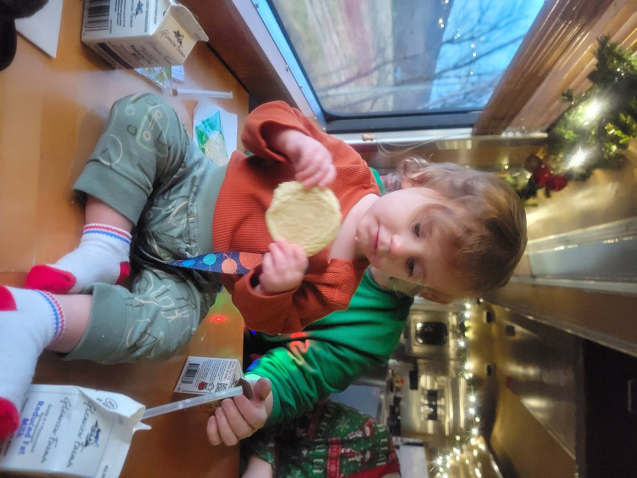Korbyn joined the competition — help win amazing prizes! baby, child, event, finger, fun, happy, holiday, lap, leisure, nail, person, play, room, sitting, smile, sock, toddler, tree