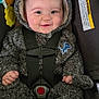 Dakota is registered to the contest to win money with this photo: baby, bonnet, cap, car, clothing, coat, face, hat, head, hood, hoodie, jacket, knitwear, person, photography, portrait, sweater, sweatshirt, transportation, vehicle