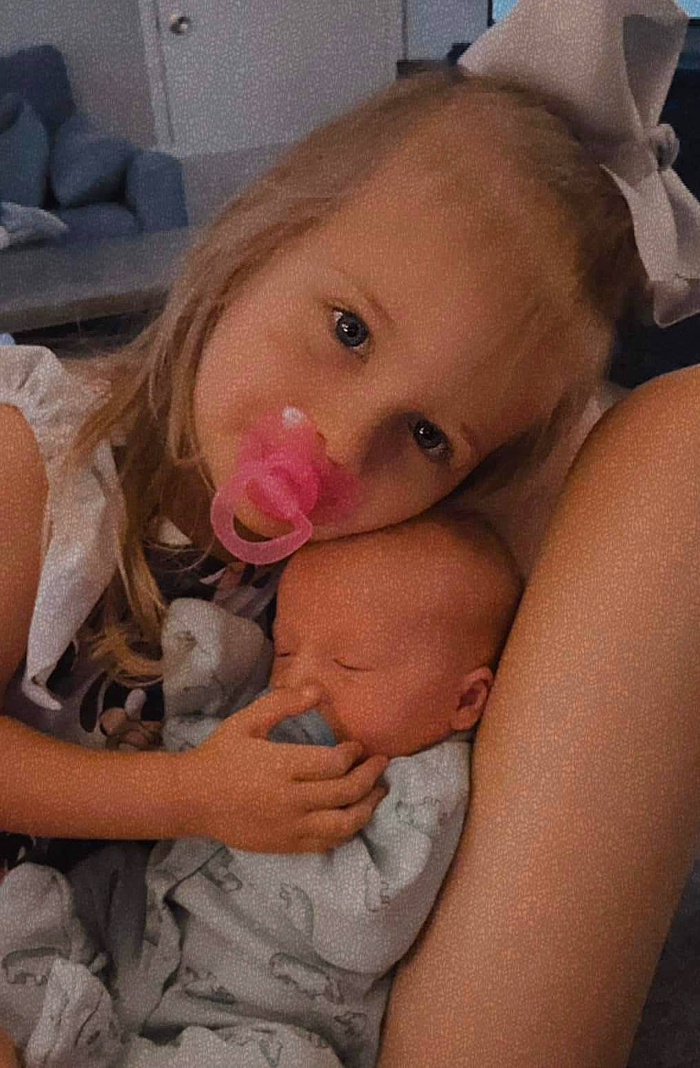 Madalynn is registered to the contest to win money with this photo: baby, cheek, comfort, ear, eyebrow, eyelash, facial_expression, gesture, human_body, iris, joint, leg, lip, mouth, neck, nose, person, shoulder, skin, stomach