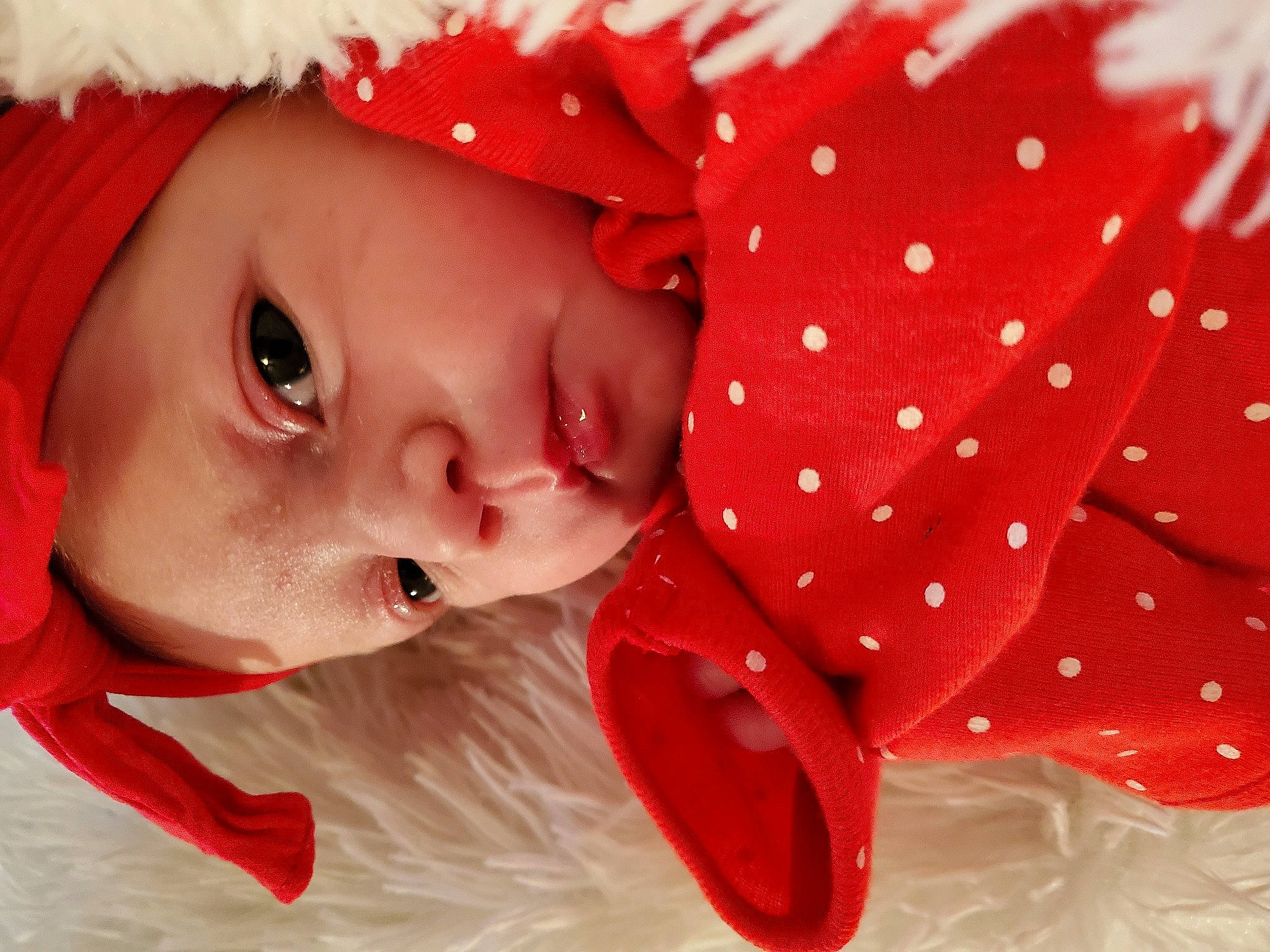 Charlotte is registered to the contest to win money with this photo: baby, baby_toddler_clothing, cheek, chin, clothing, eye, face, facial_expression, happy, headwear, human_body, lip, mammal, mouth, nose, outerwear, person, pink, skin, sleeve