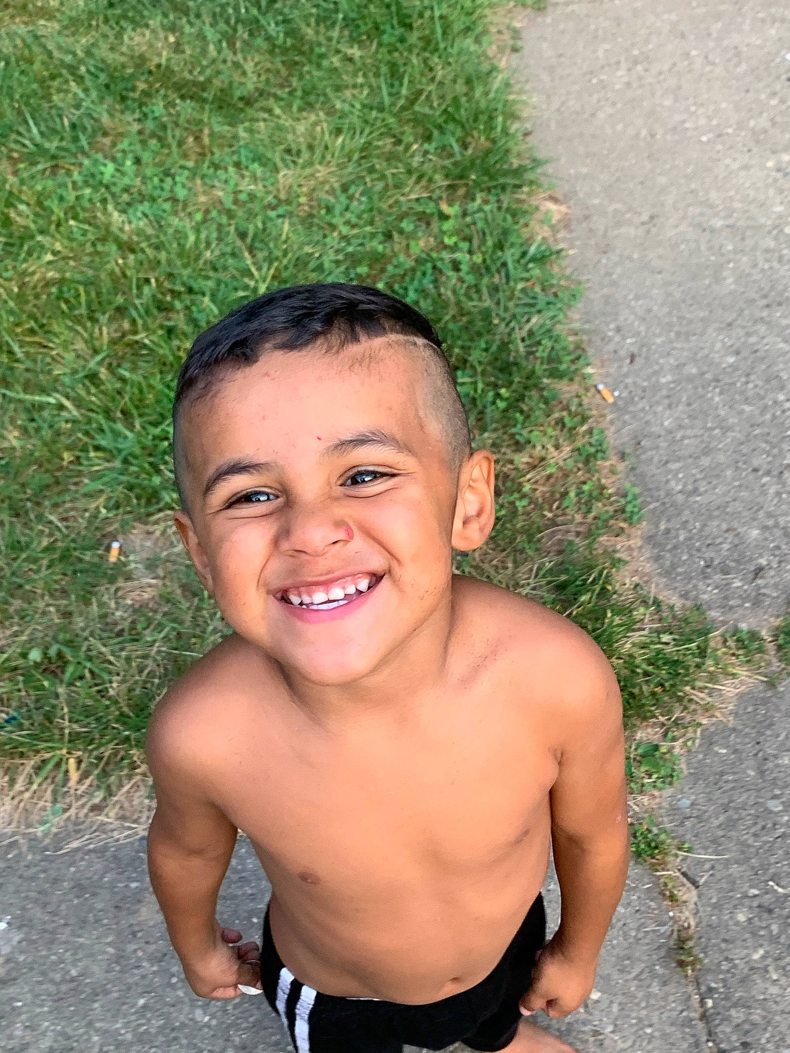 Jose is registered to the contest to win money with this photo: cheek, chest, chin, eye, flash_photography, forehead, fun, grass, hair, happy, head, human_body, joy, lip, mouth, neck, nose, people_in_nature, person, skin