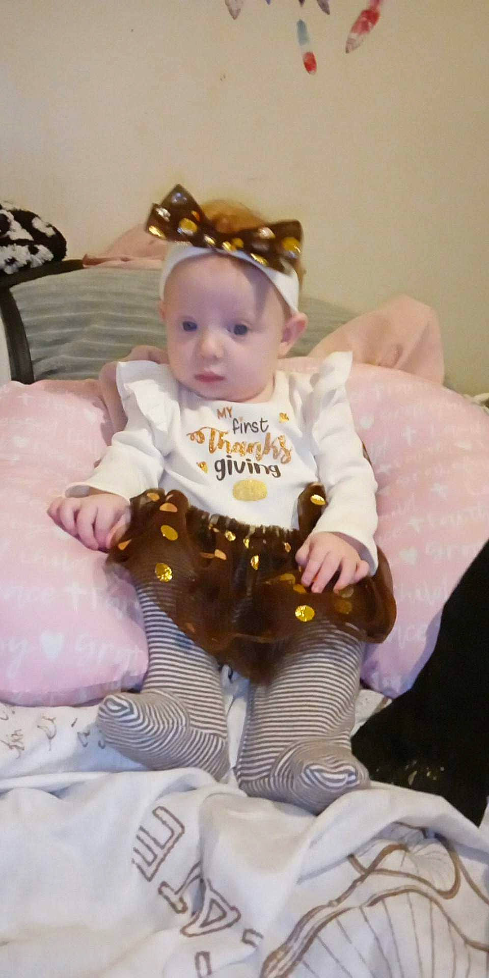 Lilith joined the competition — help win amazing prizes! baby, baby_products, baby_toddler_clothing, chair, cheek, child, comfort, costume_hat, event, fashion_accessory, fun, happy, hat, headpiece, jewellery, lap, person, sitting, sleeve, sock