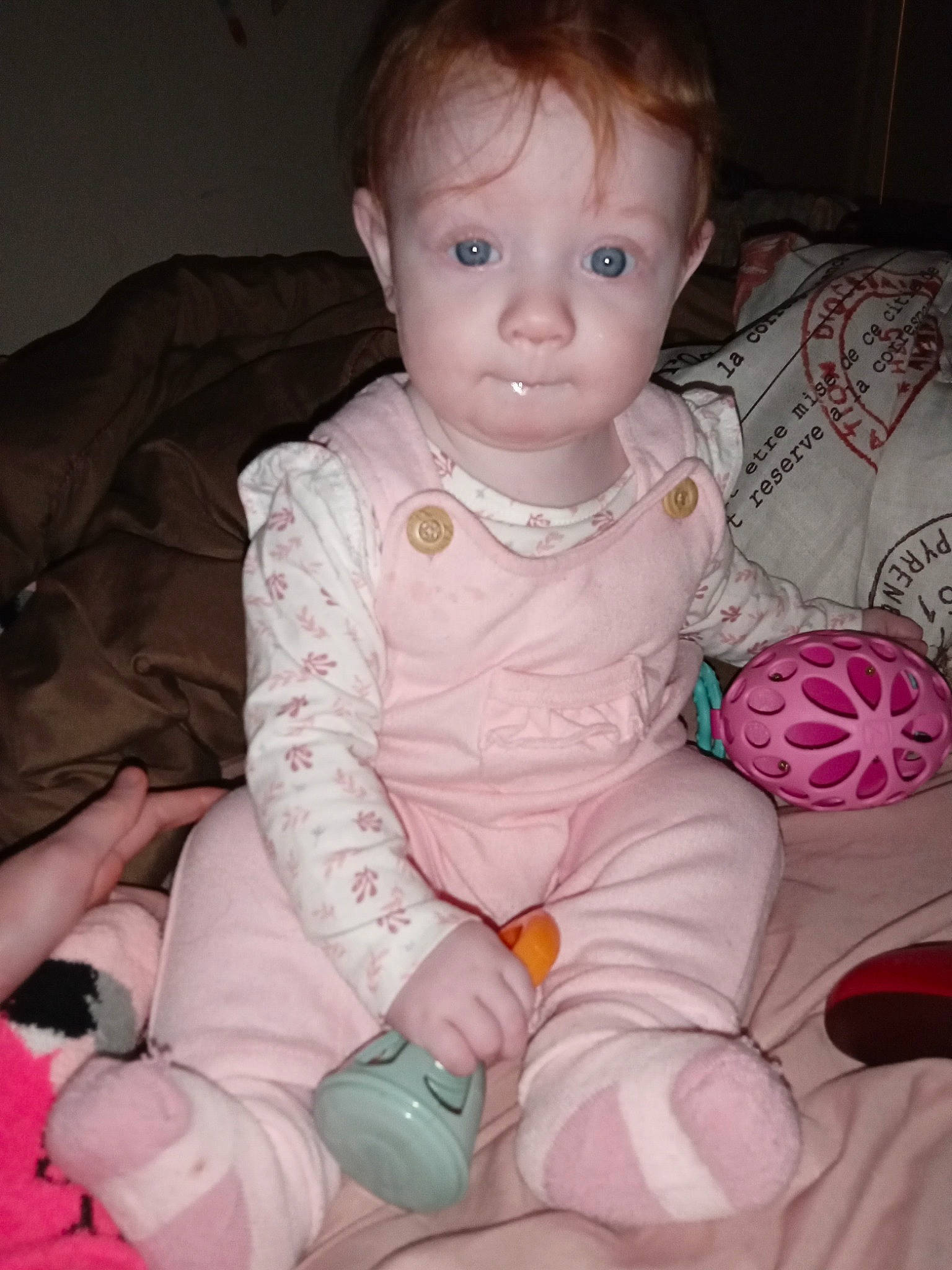 Lilith is registered to the contest to win money with this photo: baby, baby_products, baby_toddler_clothing, cheek, child, chin, comfort, eye, finger, head, human_body, iris, lip, mouth, nose, person, pink, sitting, skin, sleeve
